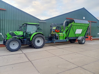 Deutz Fahr 6115 C met Heizohack chipper combi