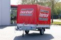 Huif aanhangers enkelasser