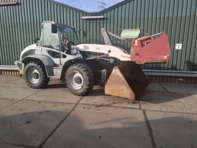 Kramer Shovel 8 Tons met Strautmann Kuilhapper